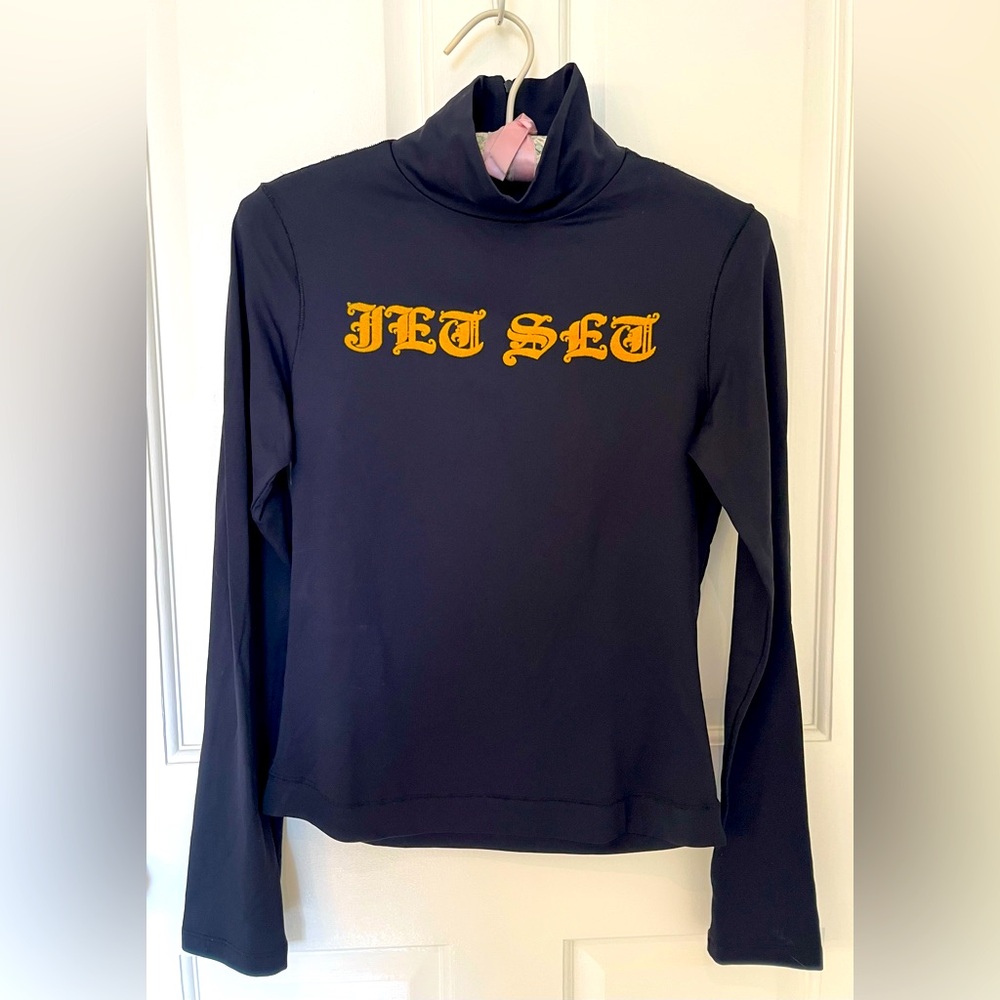 Jet Set Italy black jersey mock turtleneck top, gold flocked gothic text. Sz M